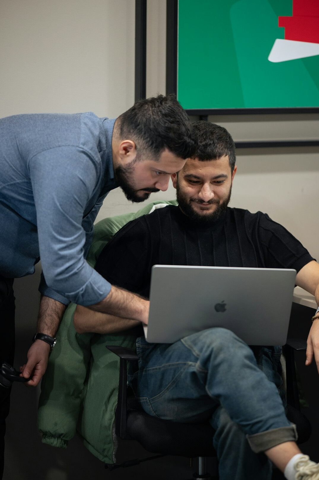 corporate team collaborating on code